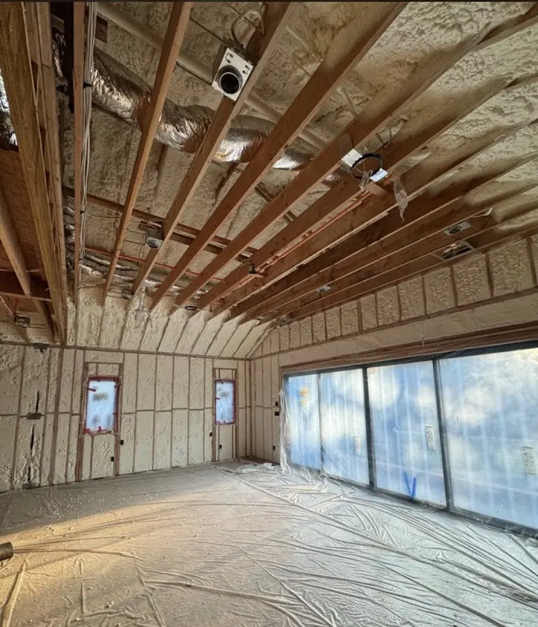 Interior walls and ceiling insulated with spray foam during new construction in Upper Moreland
